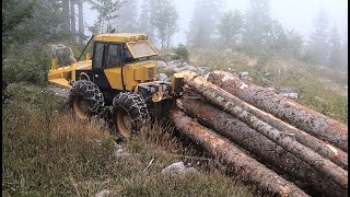 Skidder Ecotrac skidding big logs on rocky Mountain [upl. by Geffner717]