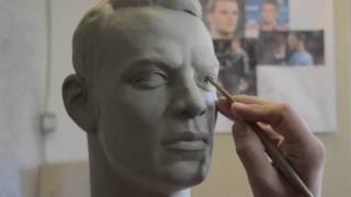 Sculpting a head in clay [upl. by Lagasse]