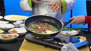 Olive Garden demonstrates how to make shrimp scampi [upl. by Vigor]