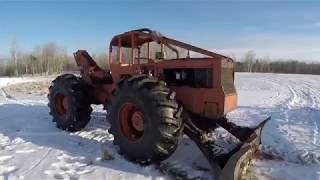 Timberjack 230 Log Skidder  Pulling Skids [upl. by Feetal]