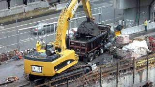 CAT 385C excavator loading a dump truck HD [upl. by Marder]