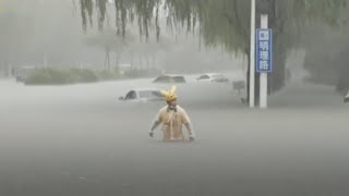 Torrential rain batters central Chinas Zhengzhou City [upl. by Nirag743]