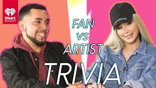 Iggy Azalea Goes Head to Head With Her Biggest Fan  Fan Vs Artist Trivia [upl. by Hannavas]