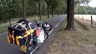 Part 1 Netherlands Netherlands to Australia on a Honda C90 Cub Escape from the race [upl. by Rimidalv724]