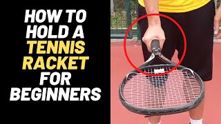 How to hold a tennis racket for beginners [upl. by Kovar978]