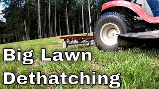 Dethatching With A Tow Behind Dethatcher  Fall Lawn Care  Part 1 of 5 [upl. by Eiramlehcar]