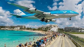 BOEING 747 low LANDING above THE BEACH  St Maarten and Maho Beach 4K [upl. by Strohl]