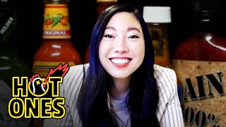 Awkwafina Gets Hot and Cold While Eating Spicy Wings  Hot Ones [upl. by Aitsirt]