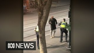 GRAPHIC VISION  Police shoot knifewielding man in Bourke Street  ABC News [upl. by Delfeena]