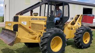 John Deere 340D Skidder for sale at Auction [upl. by Anielram]