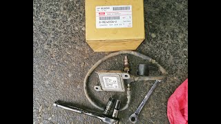 How to replace a DEF DCM EXH NOX sensor on a 2014 Isuzu NPR [upl. by Ettenuahs]