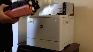 Changing the toner in the printer  HP Color Laserjet Enterprise [upl. by Verada]