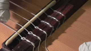 How to restring a classical guitar [upl. by Hereld]