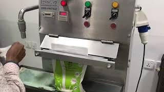 Semi automatic milk packing machine [upl. by Waverley989]