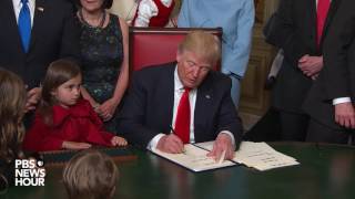 Trump signs first official documents as US president [upl. by Aronle]