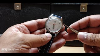 How to change a strap of an HMT watch [upl. by Ellehcram621]