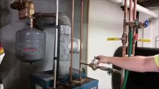 How To Remove Air From Your Heating System [upl. by Lezlie718]